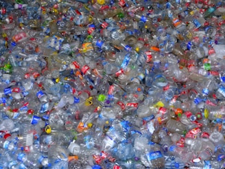 A pile of plastic bottles filled with water
