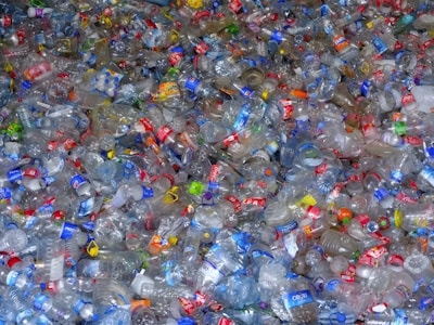 A pile of plastic bottles filled with water