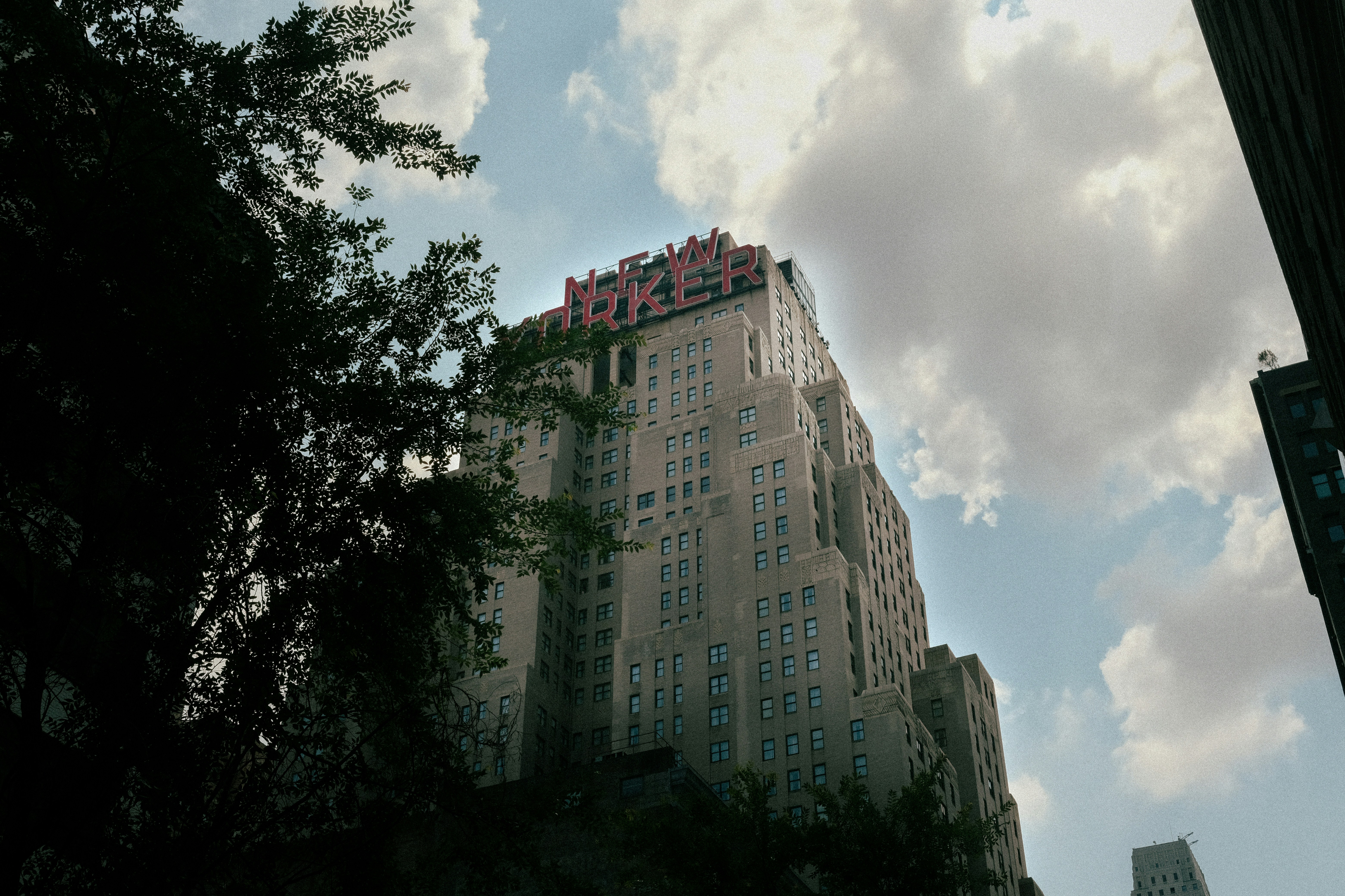 A tall building with a sky background