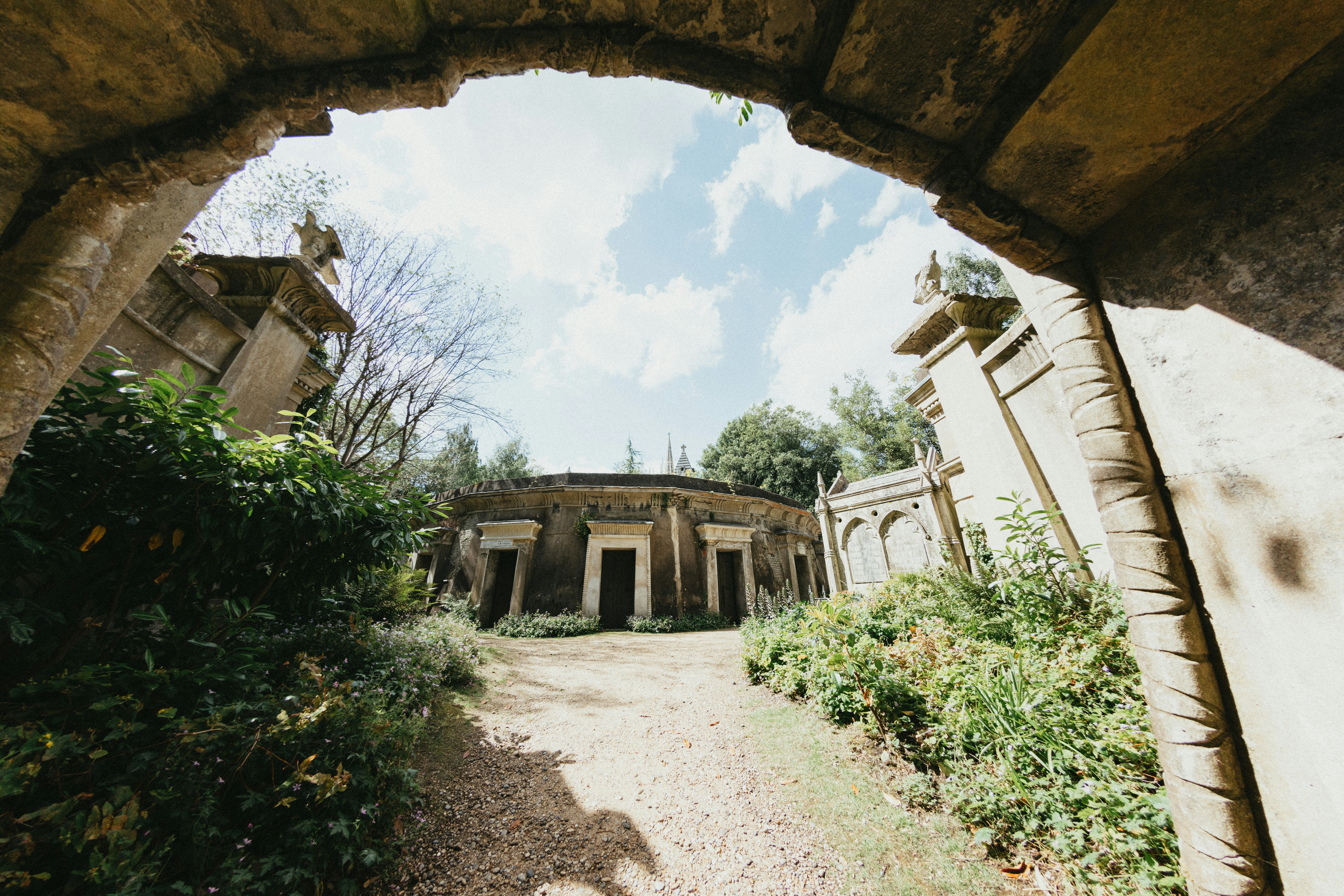 A view of a building through an archway, 