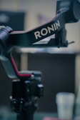 A close up of a camera on a tripod