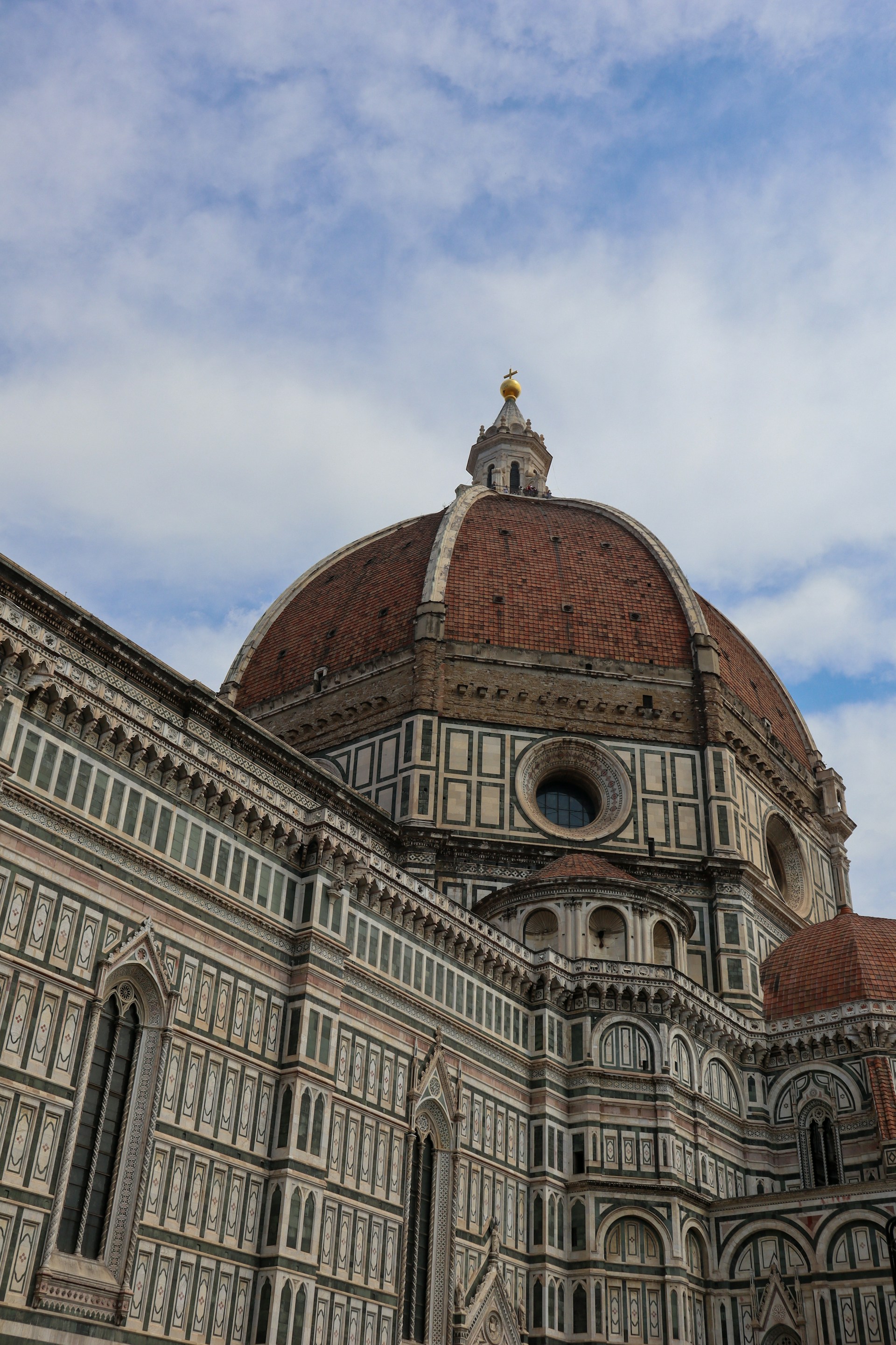 A large building with a clock on the top of it