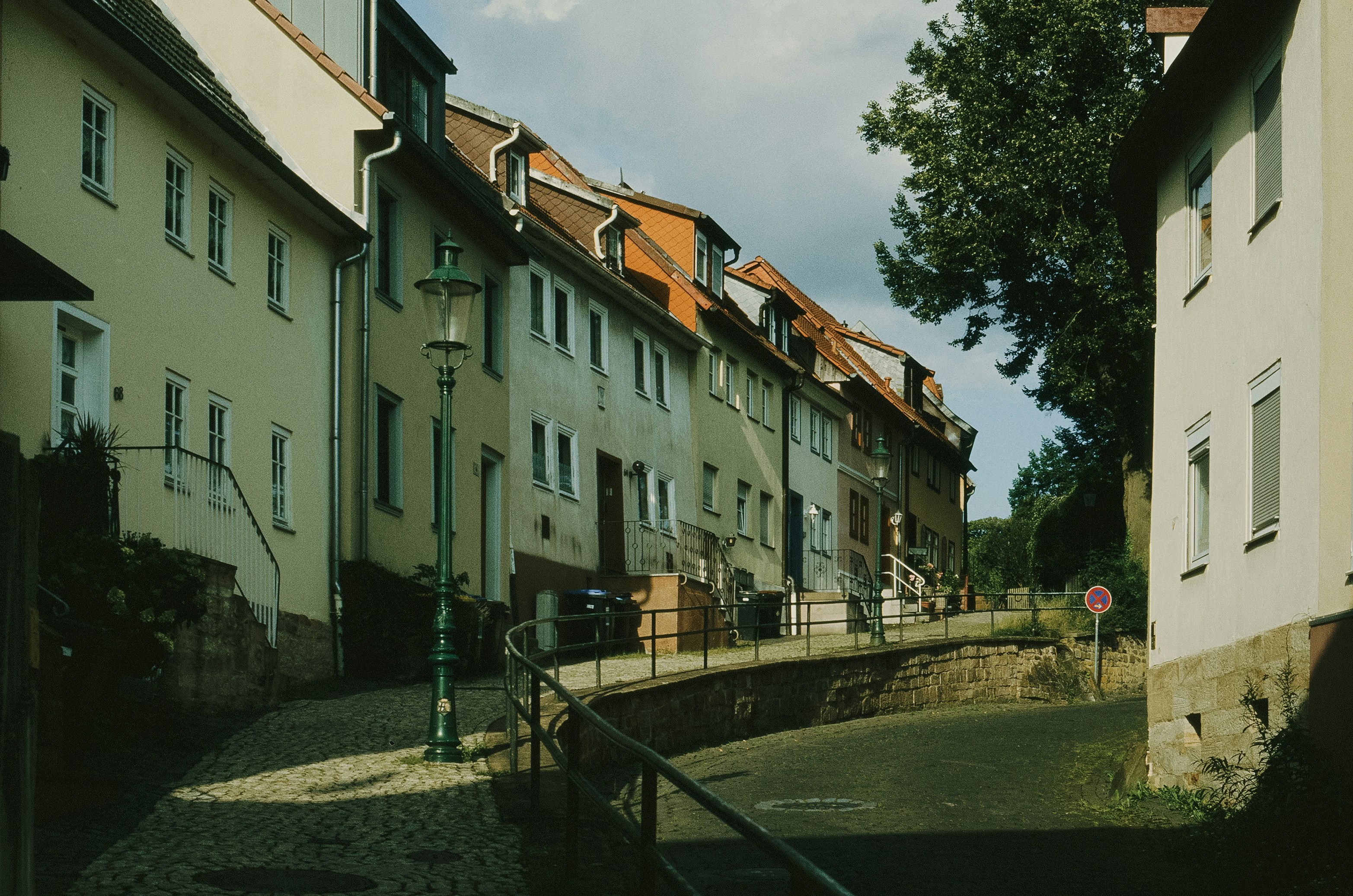 A row of houses next to a river