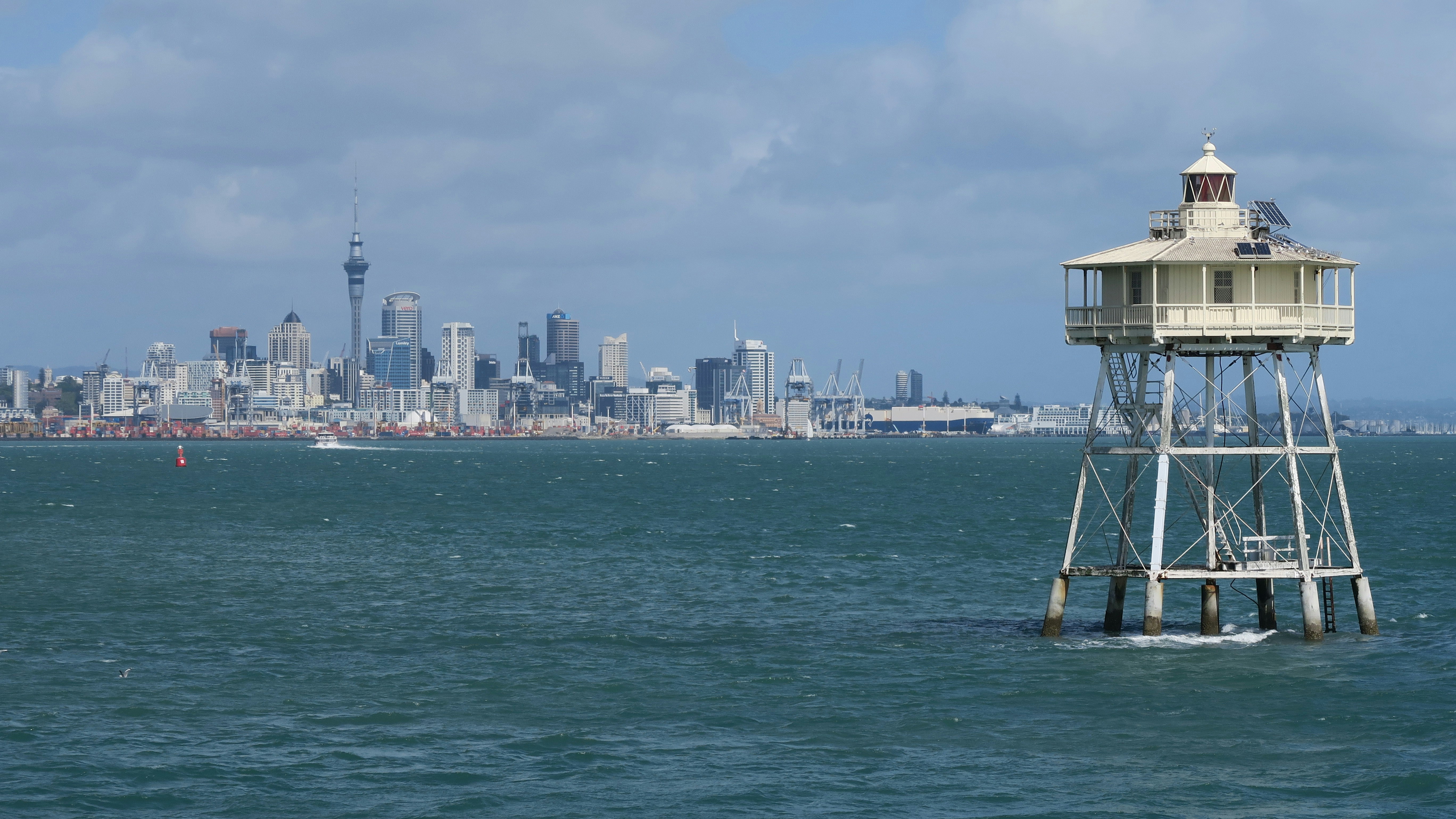 A large body of water with a tower in the middle of it