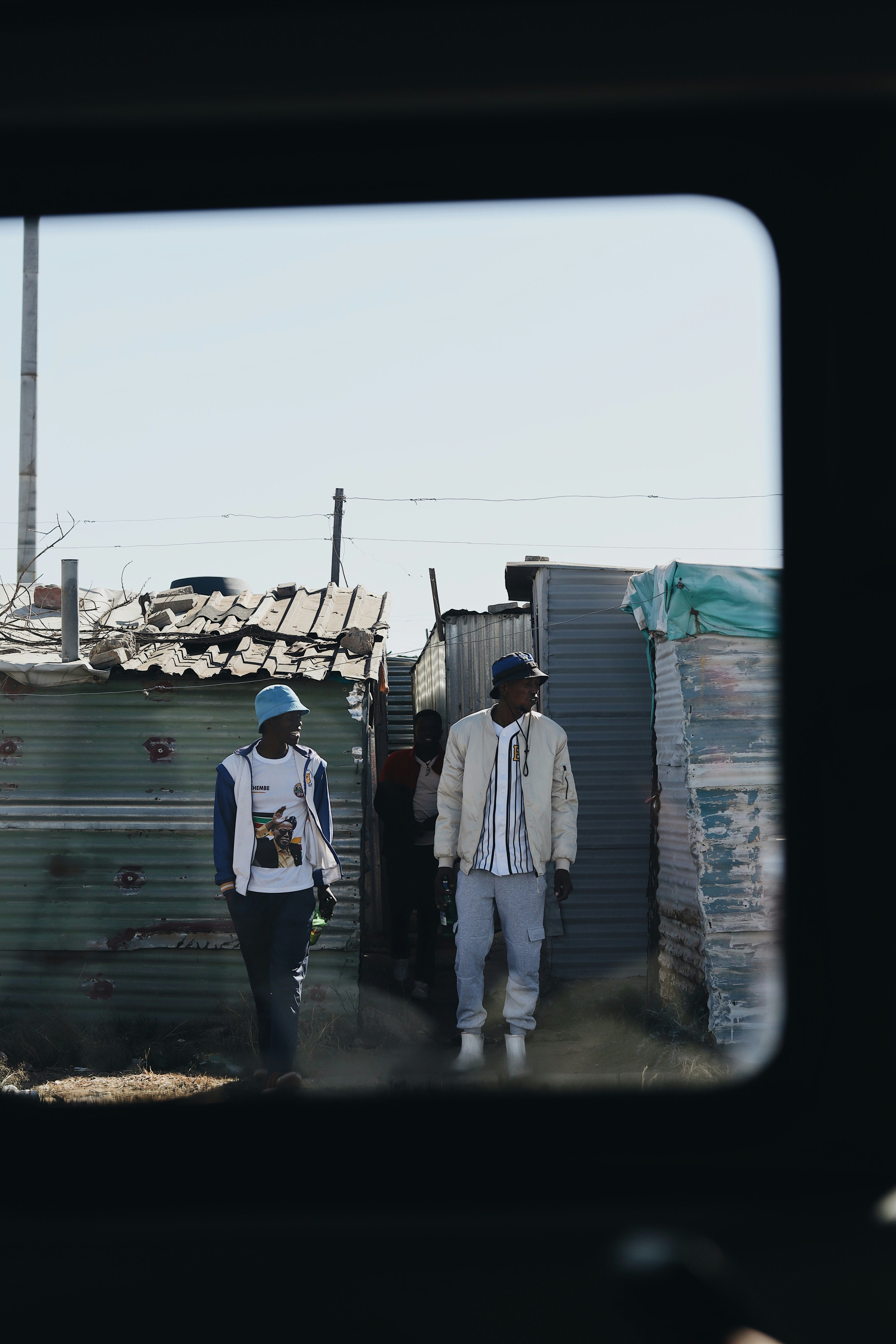 A couple of men standing next to each other