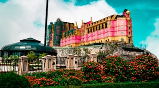 A large building with a flag on top of it
