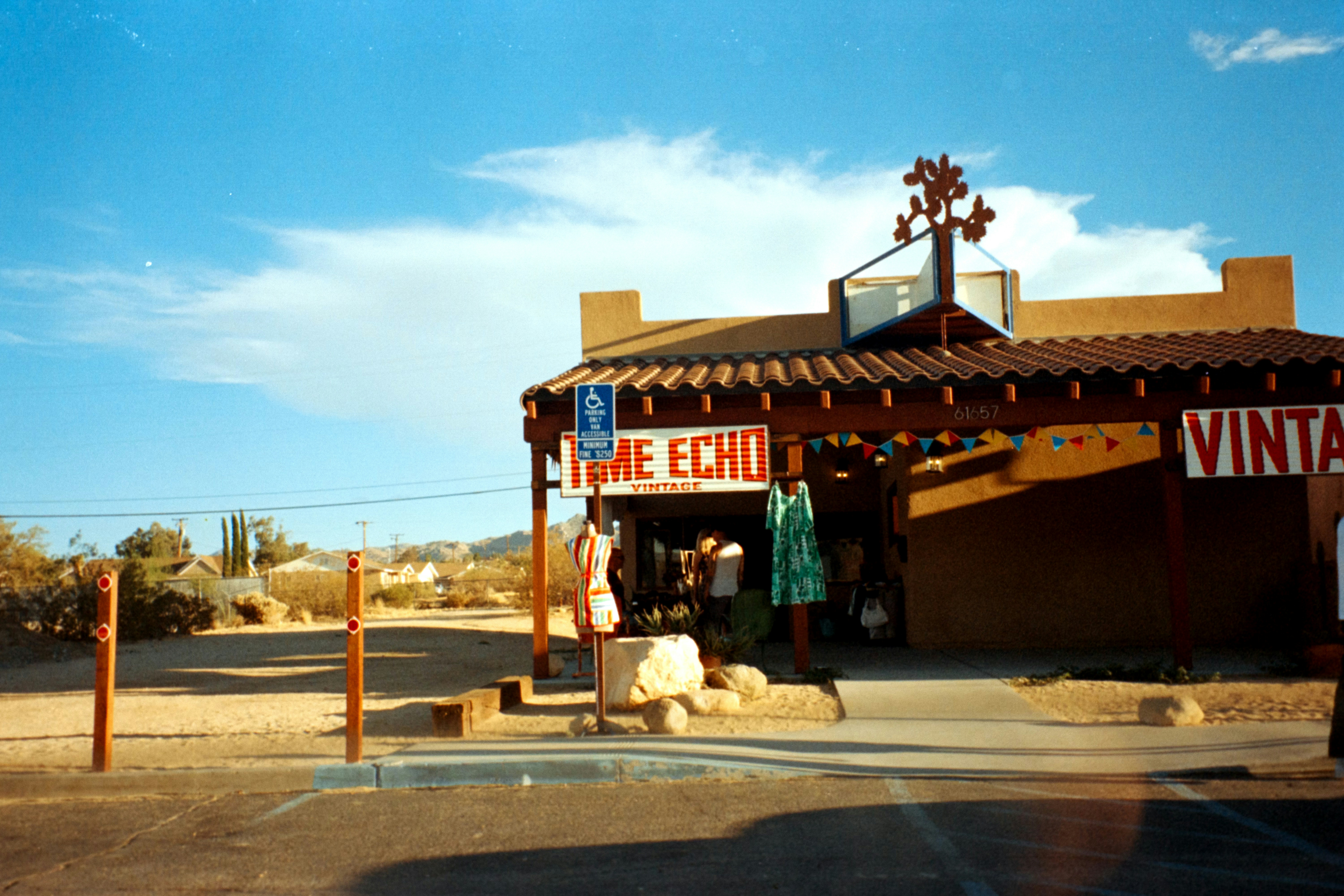 A building with a sign and a cross on top of it