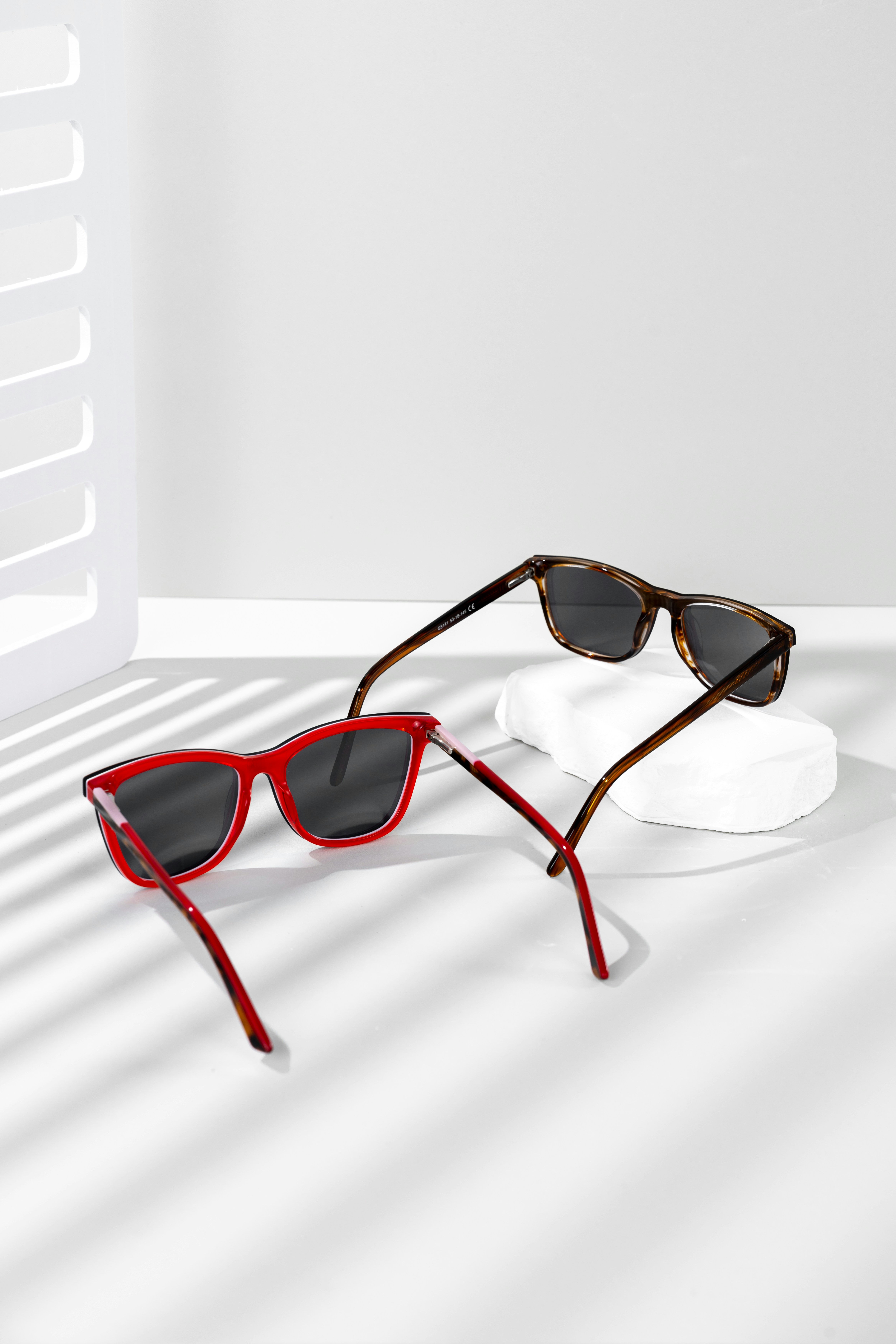 A pair of sunglasses sitting on top of a table