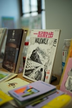 A bunch of books that are on a table