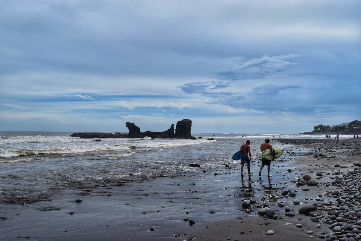 Two people standing in the warm Pacific water