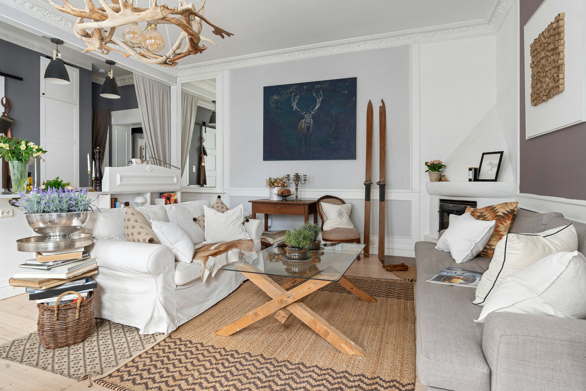 A living room filled with furniture and a chandelier