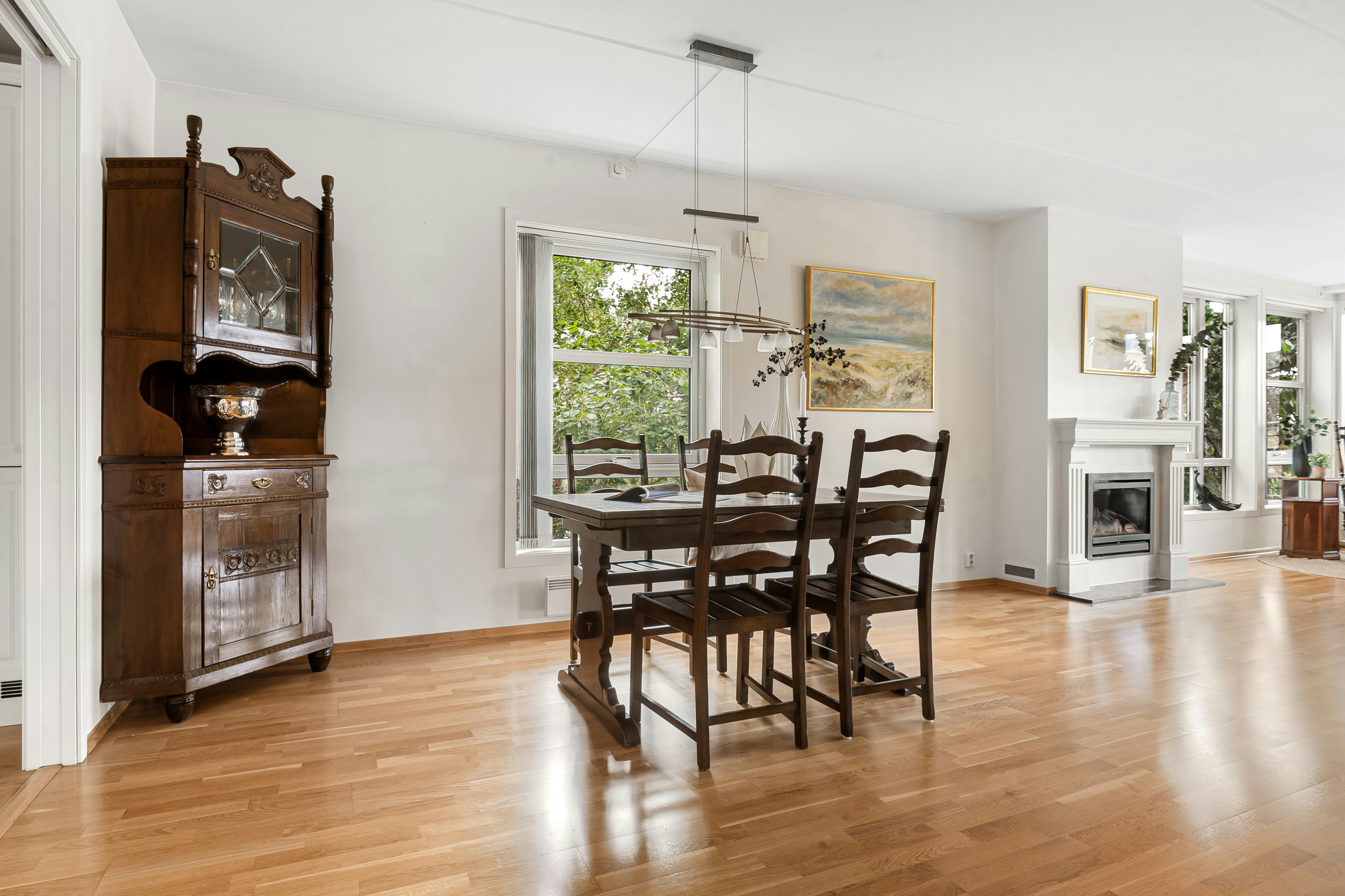 A living room filled with furniture and a fire place