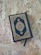 A blue book sitting on top of a wooden floor