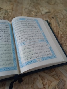 A close up of an open book on a table