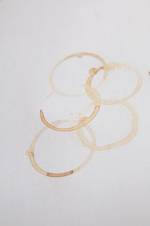 A couple of rings sitting on top of a piece of paper