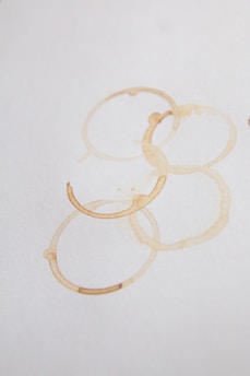 A couple of rings sitting on top of a piece of paper