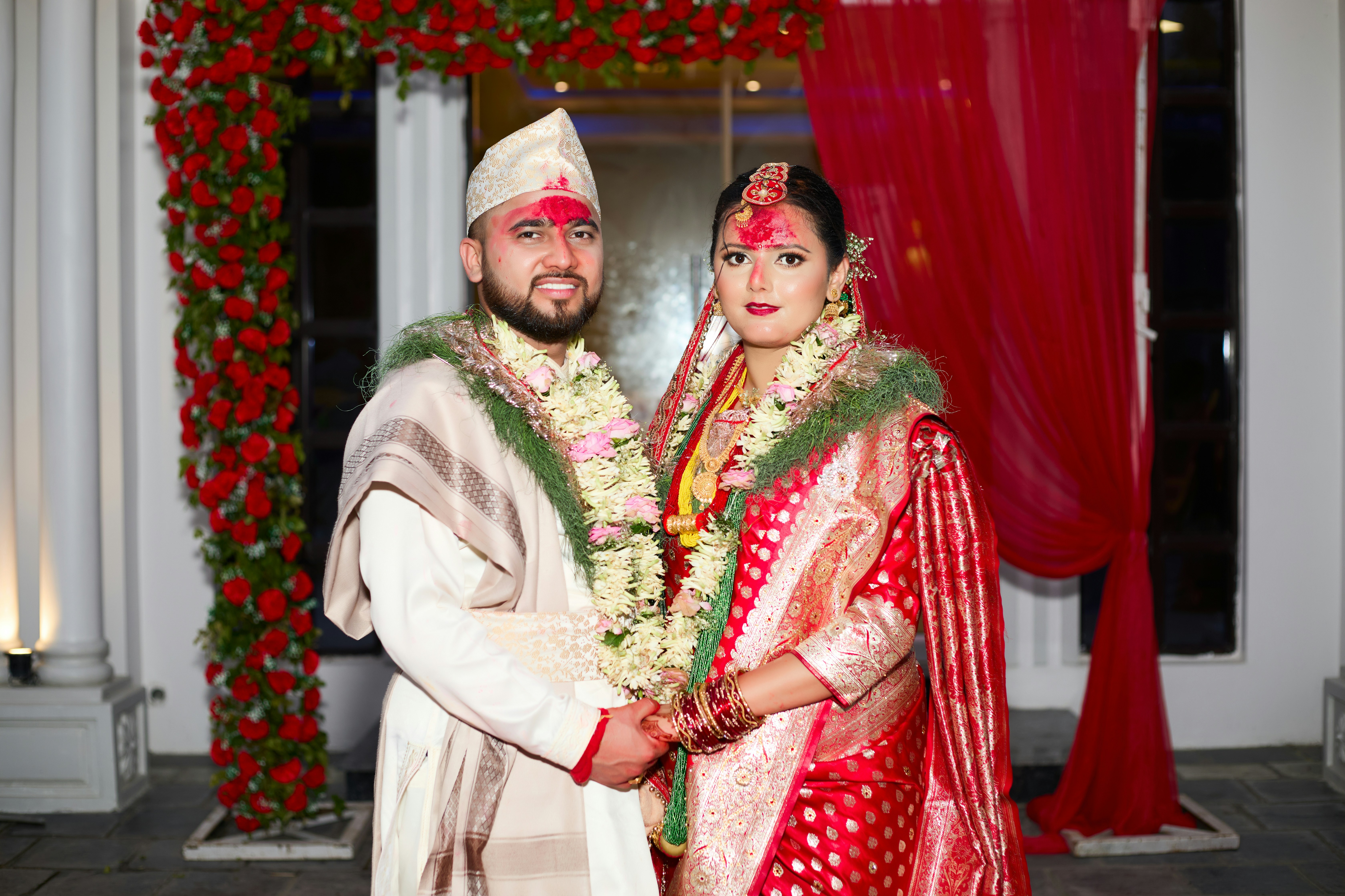 A man and a woman dressed in traditional indian garb