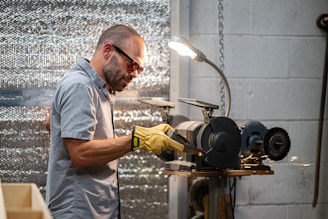 A man working on a machine in a factory