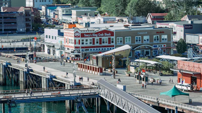 An aerial view of a city with a bridge
