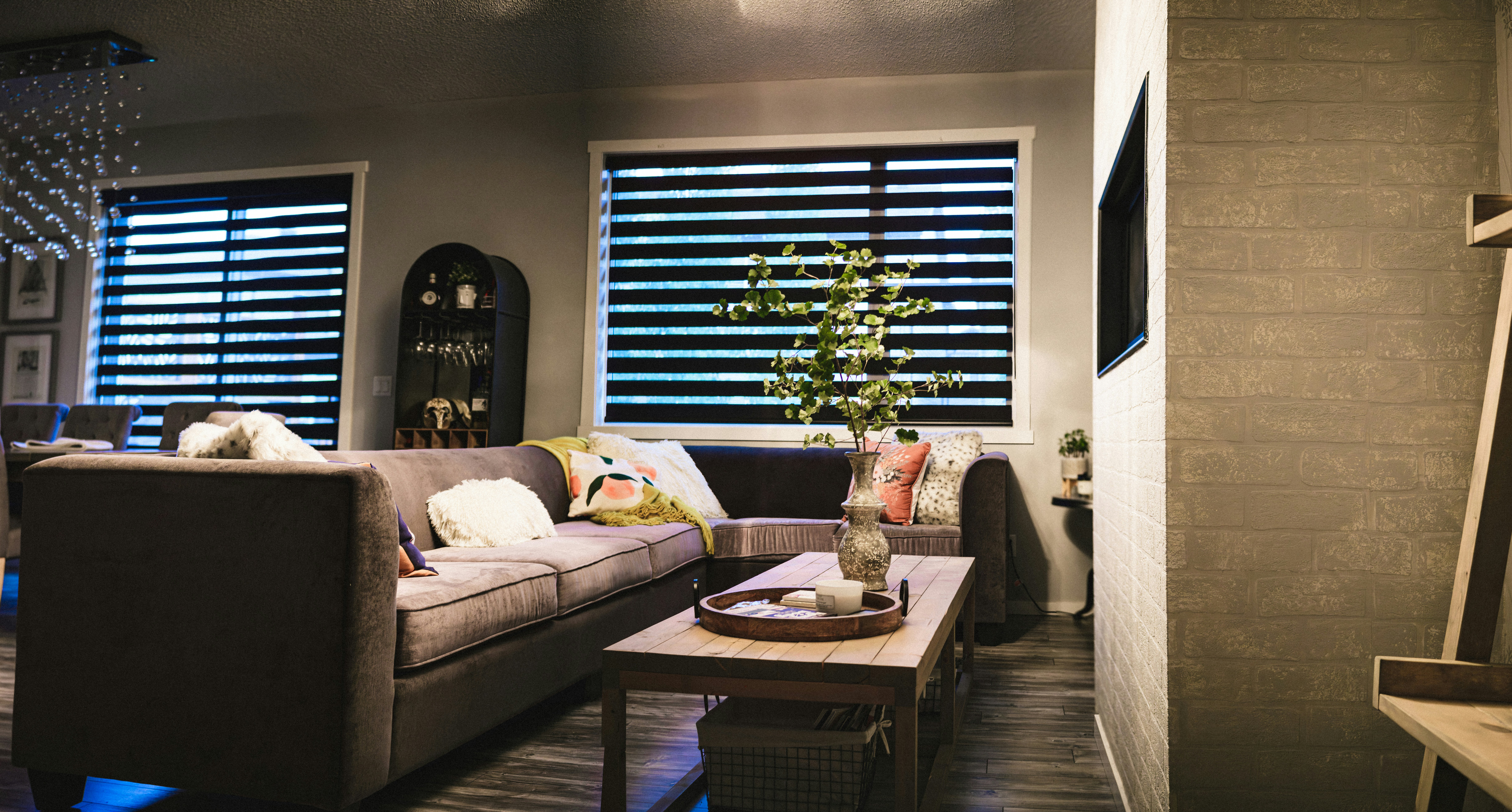 A living room with a couch and a coffee table