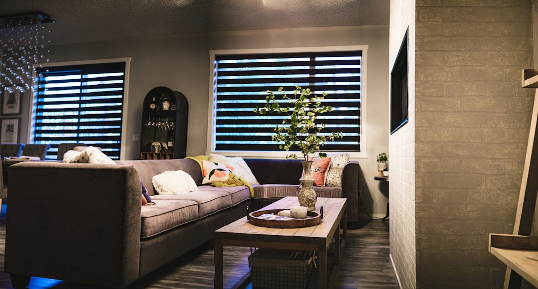 A living room with a couch and a coffee table