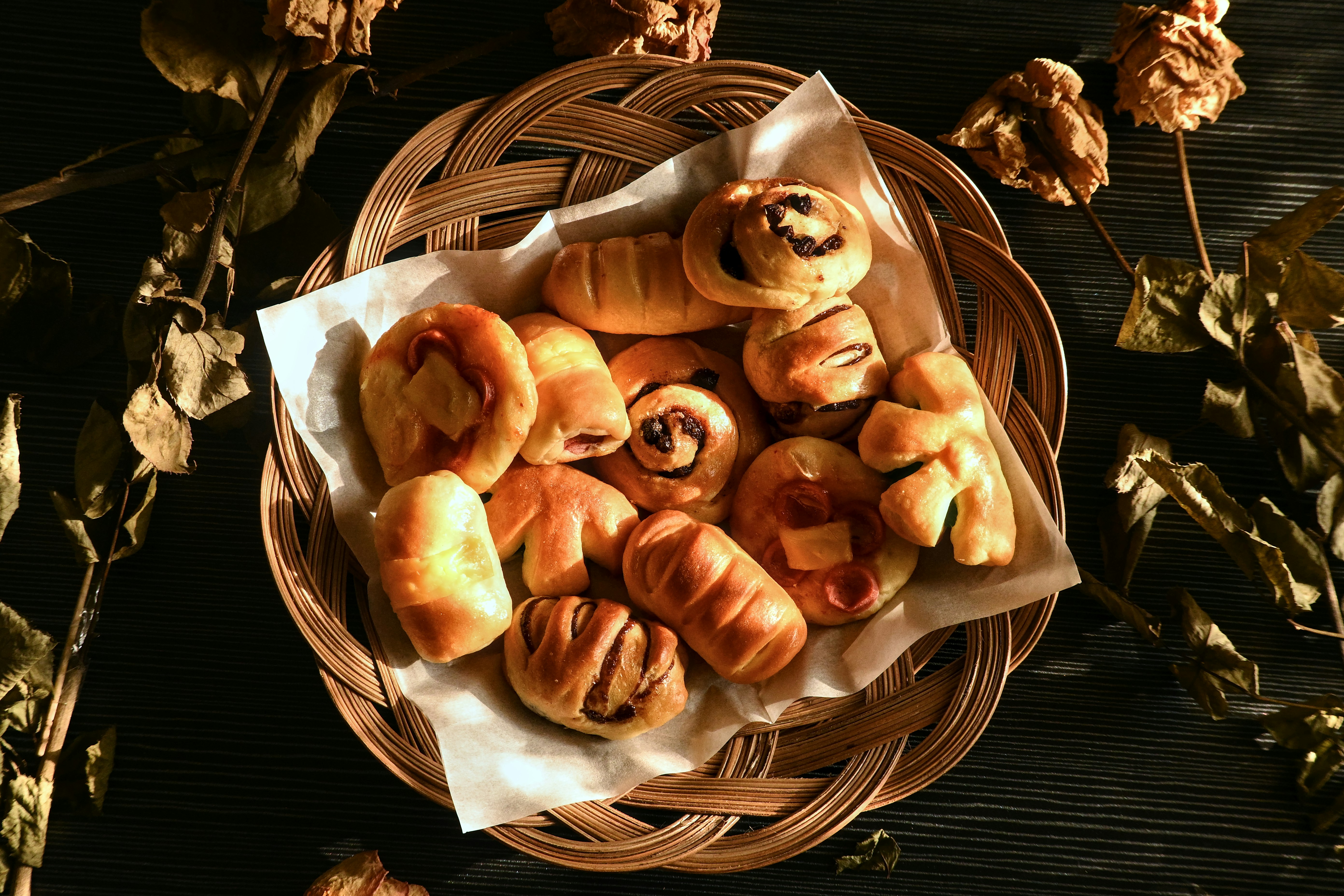 A basket of croissants sitting on top of a table