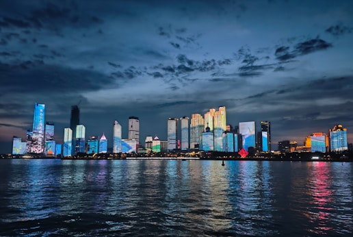 A large body of water with a city in the background