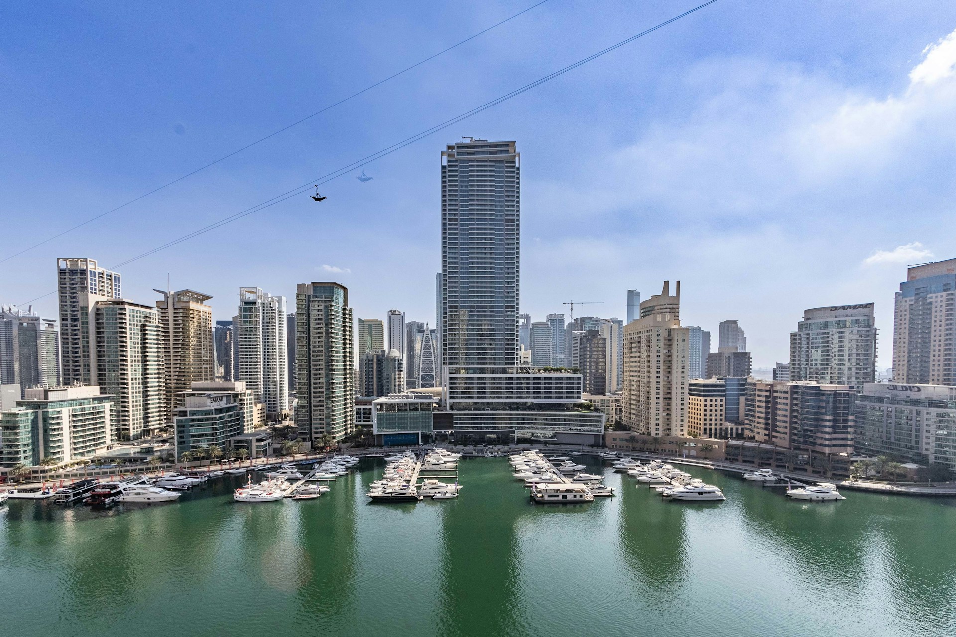 A large body of water surrounded by tall buildings