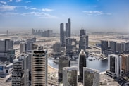 An aerial view of a city with tall buildings