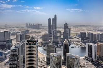 An aerial view of a city with tall buildings