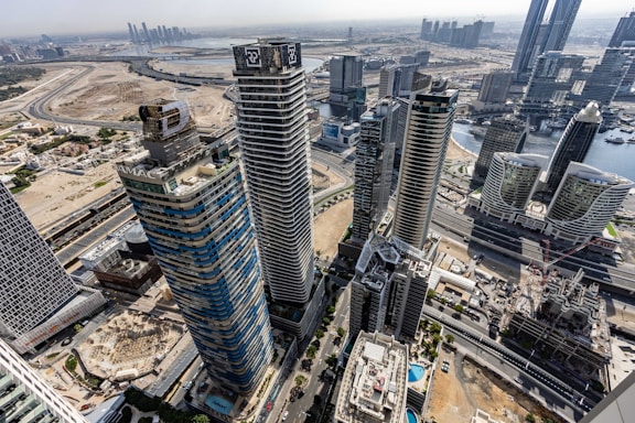 An aerial view of a city with tall buildings