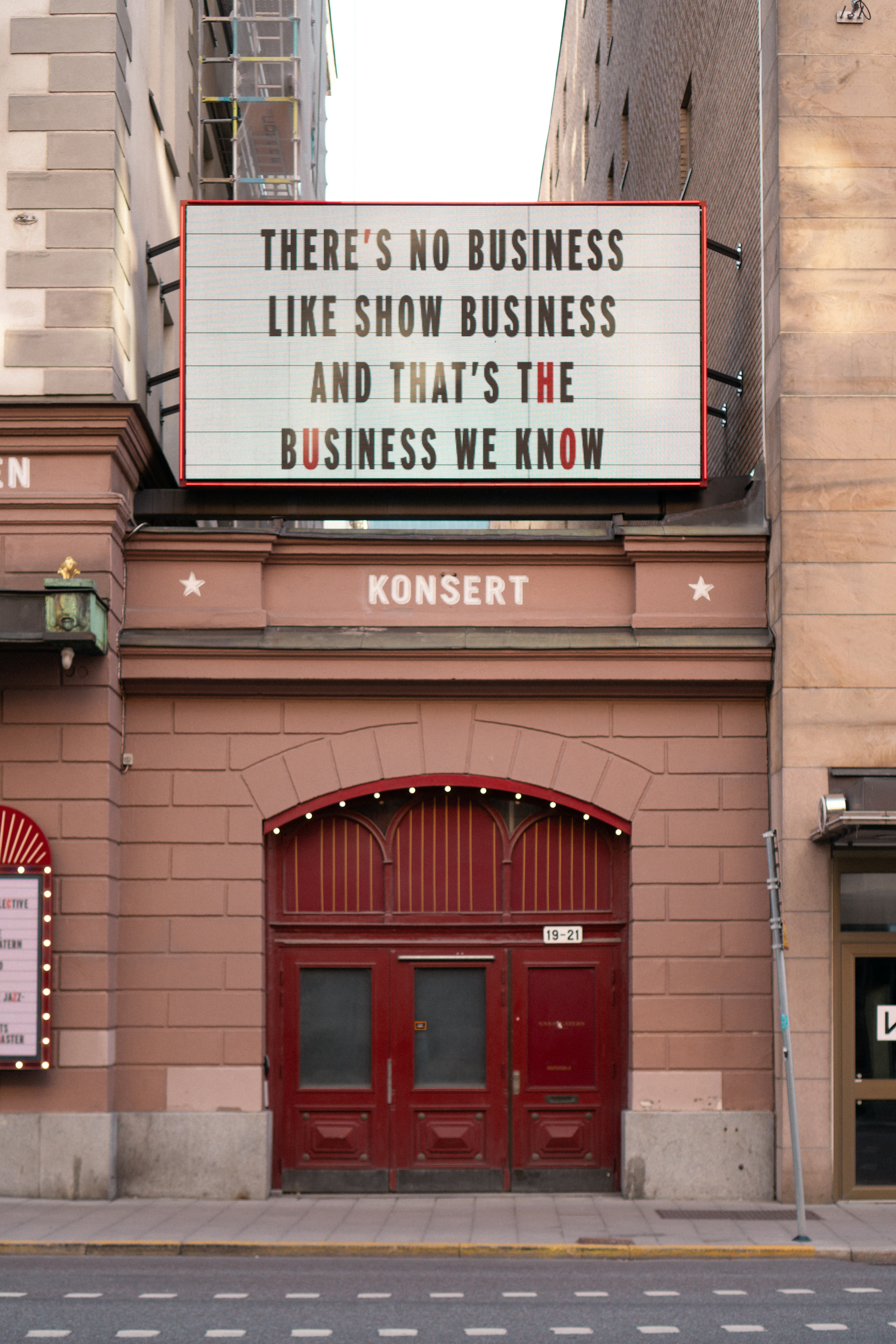A sign that says there's no business like show business and that's