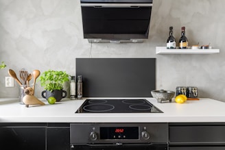 A stove top oven sitting inside of a kitchen