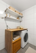 A laundry room with a washer and dryer