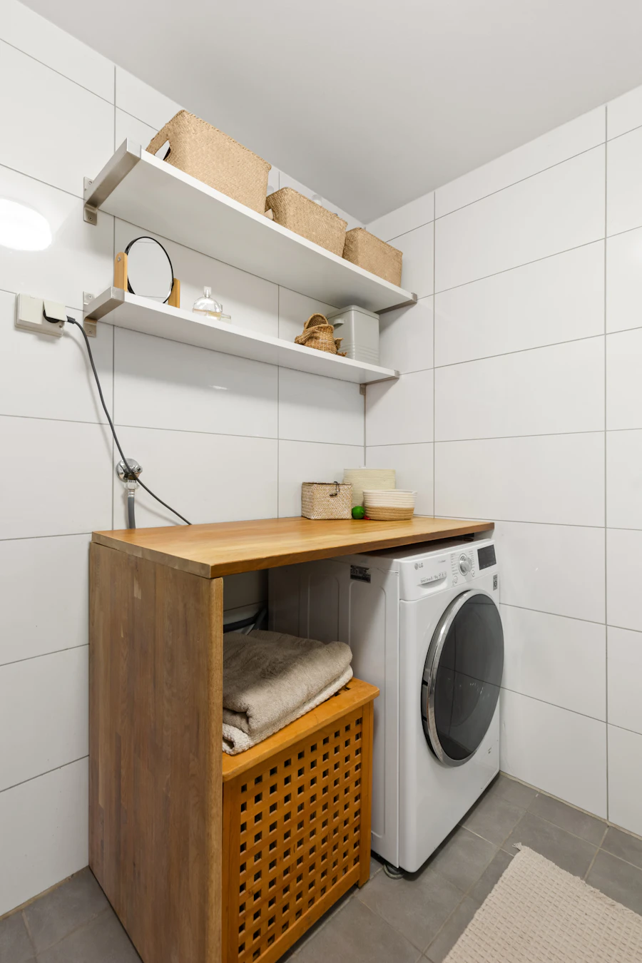 Open shelves in custom laundry cabinet