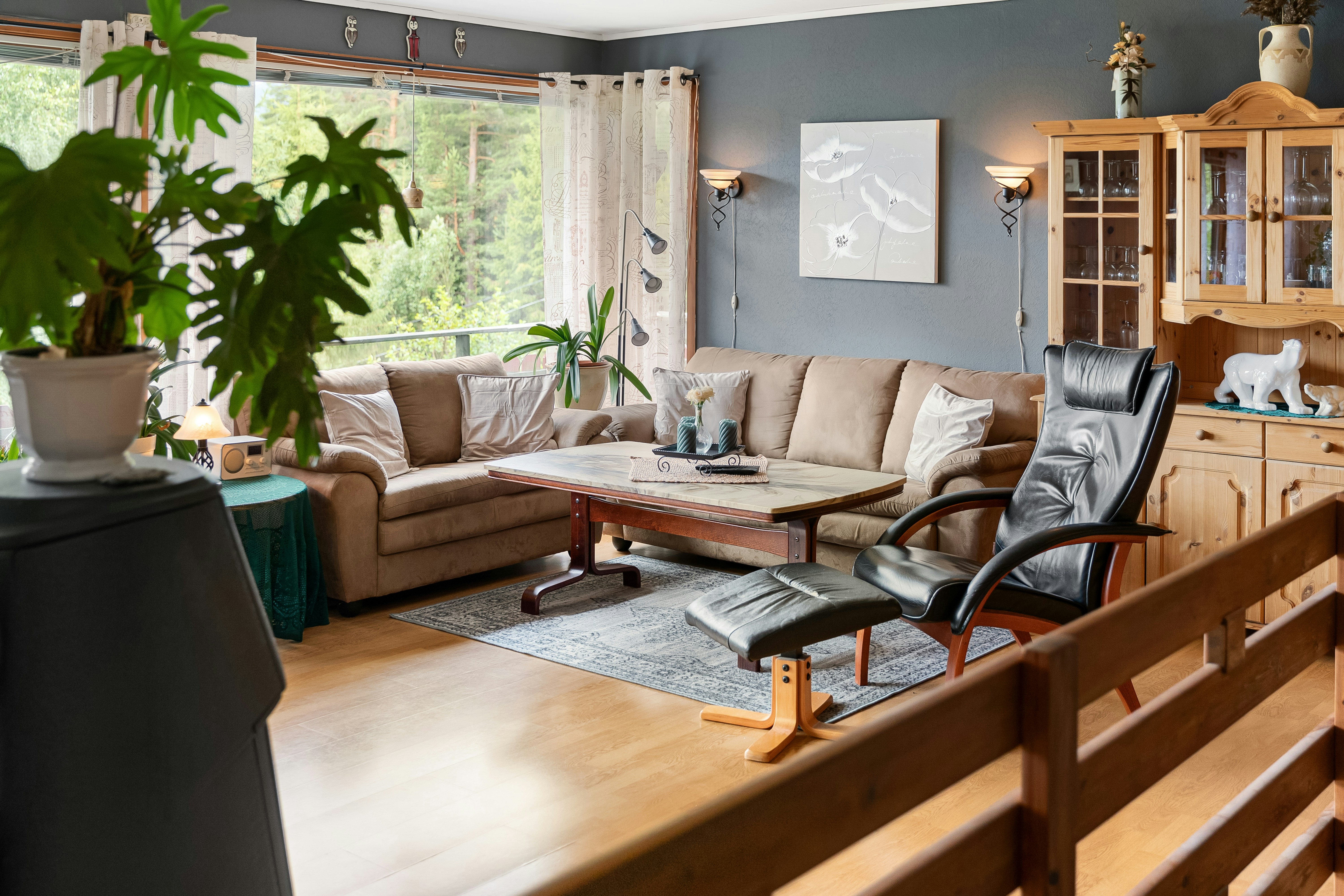 A living room filled with furniture and a large window