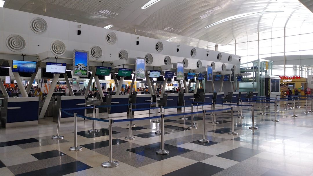 An airport with a check in area and a check in counter, Baggage check in counter at Kualanamu International Airport (KNO)