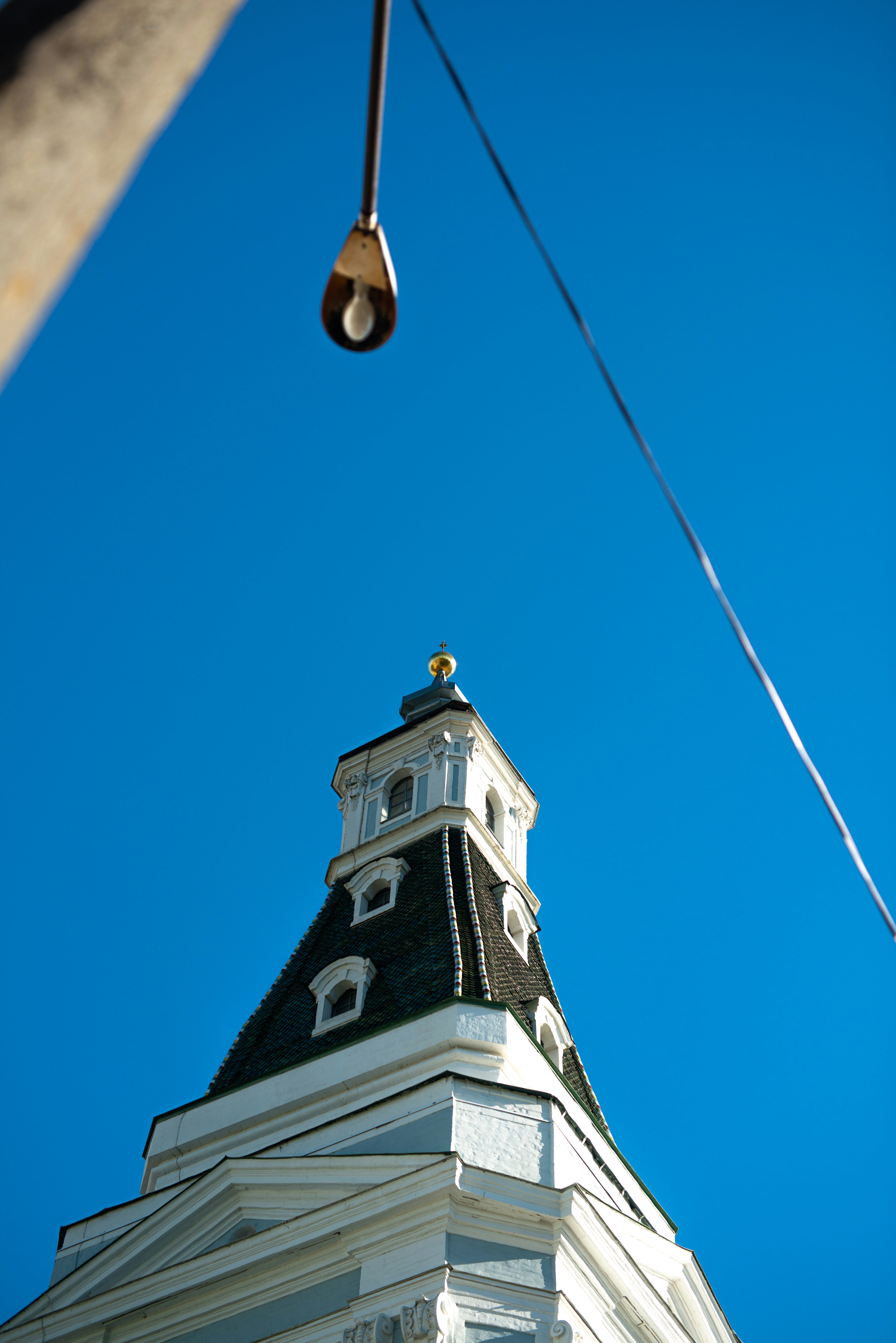 A tall building with a clock on the top of it