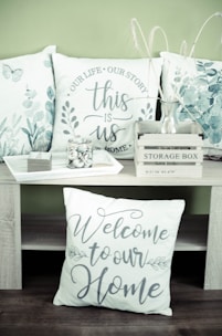 A couple of pillows sitting on top of a table