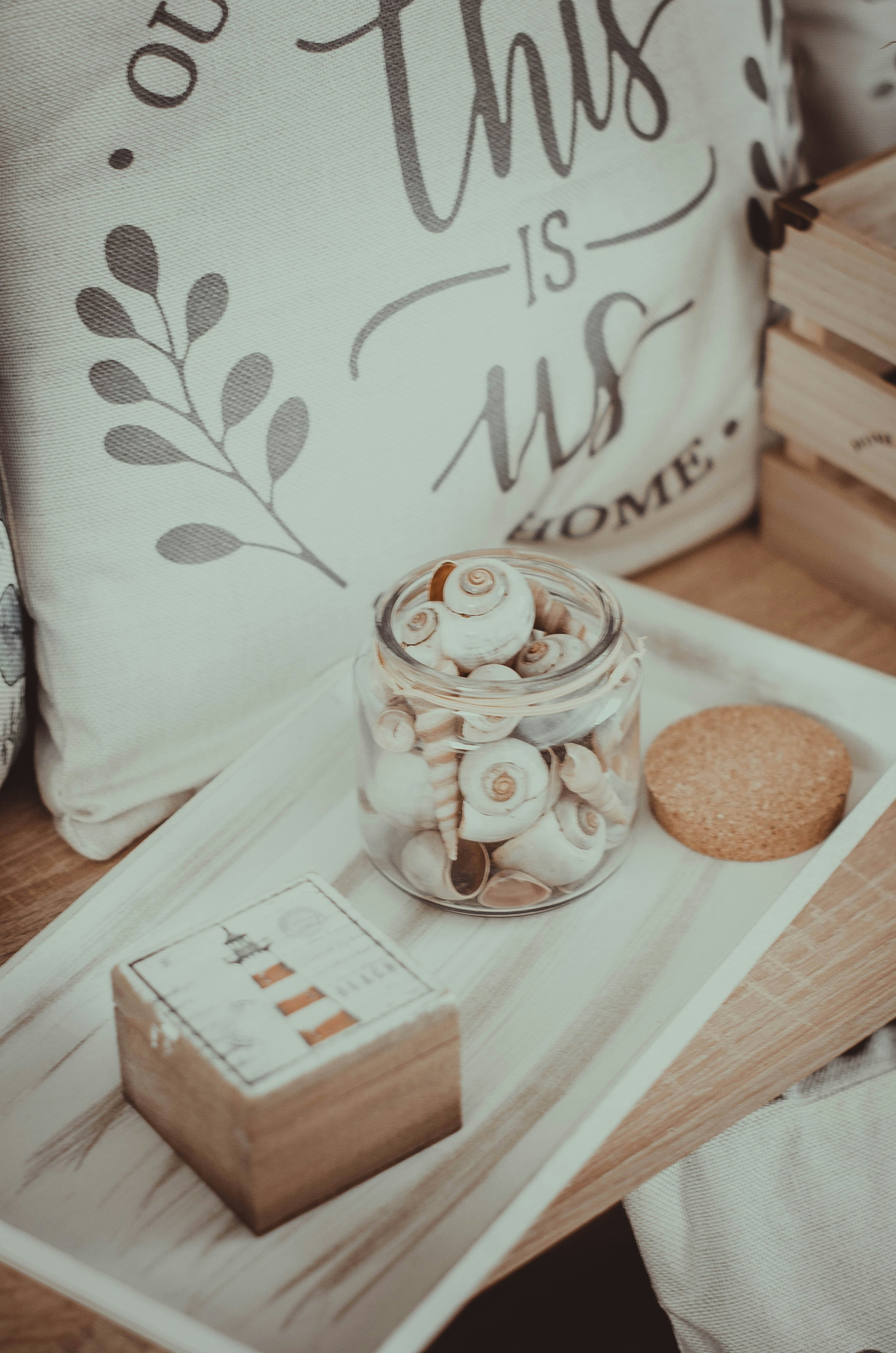 A tray of cookies and a pillow on a bed