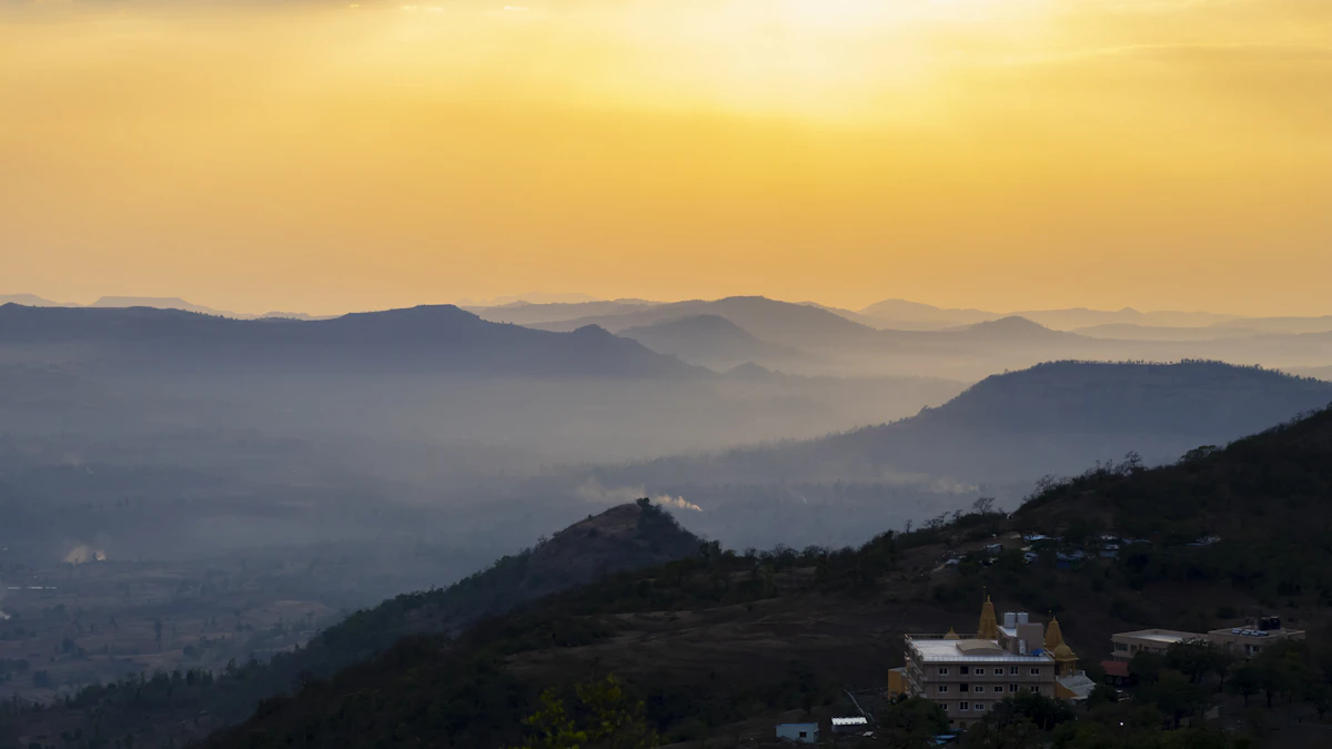 Layered hills at golden hour in Saputara