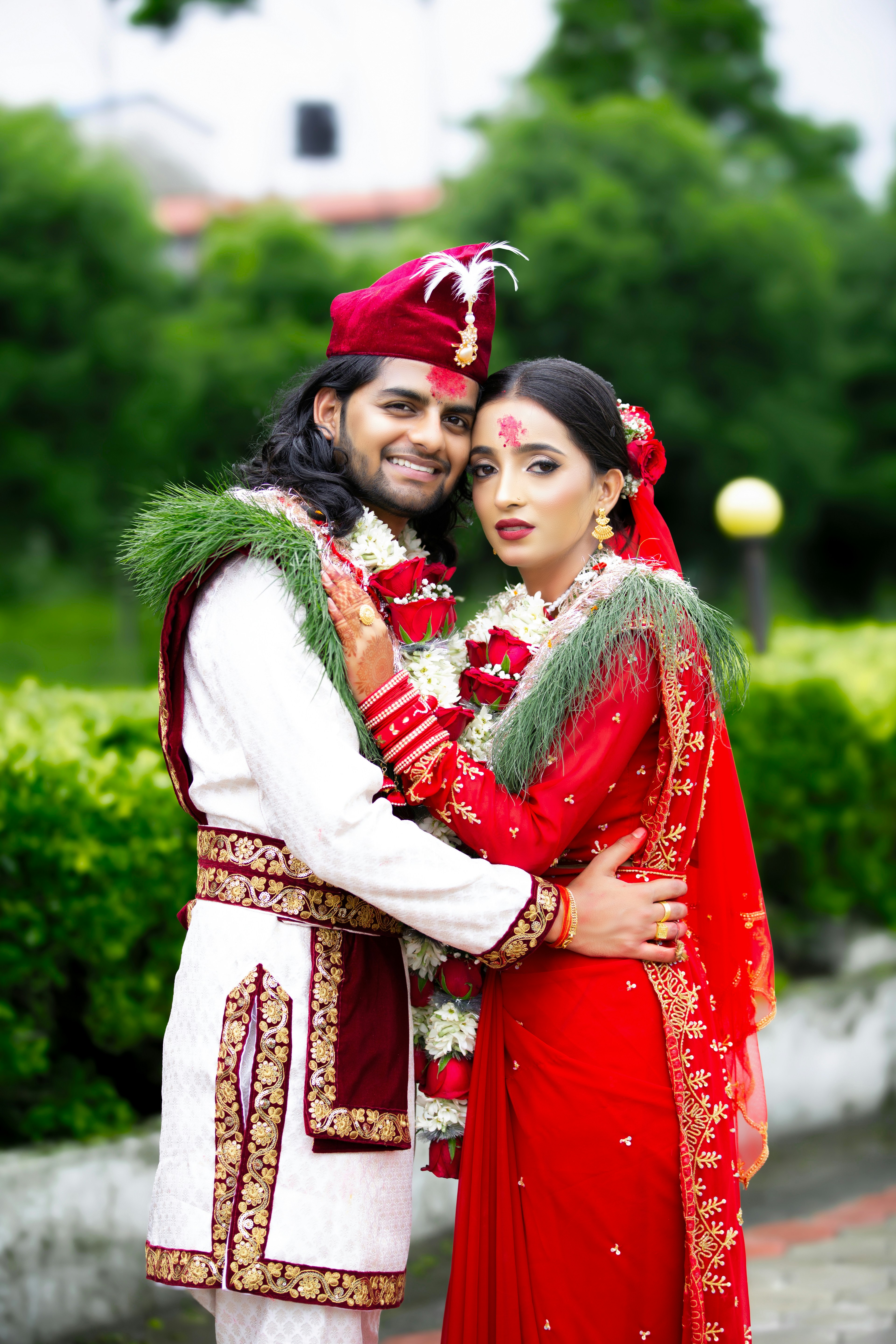 A man and woman dressed in traditional indian garb