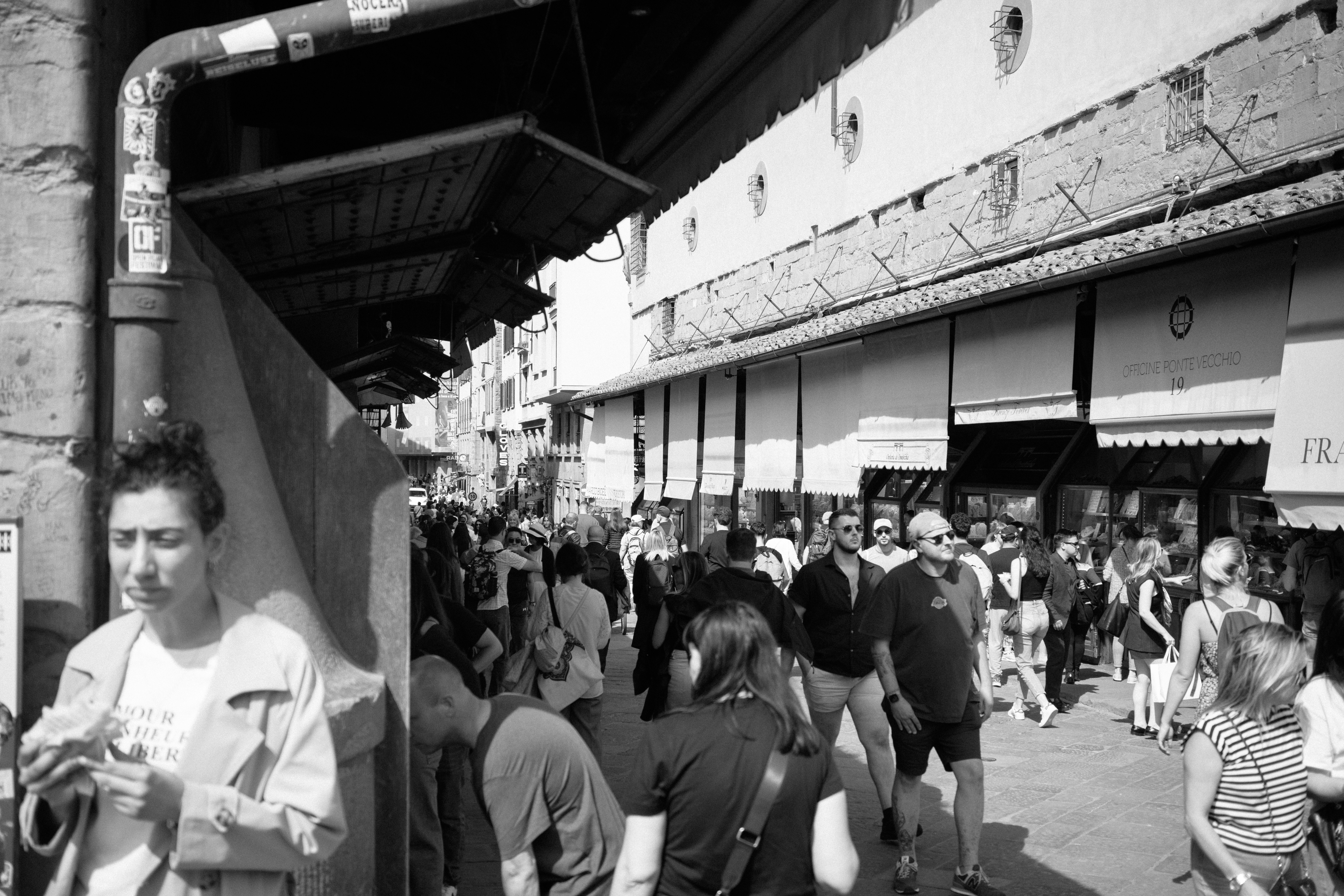 A black and white photo of a crowd of people