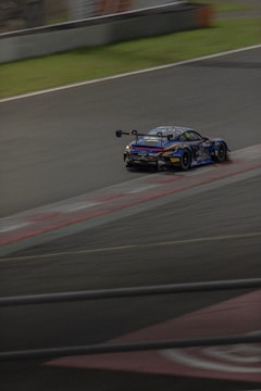 A race car driving down a race track