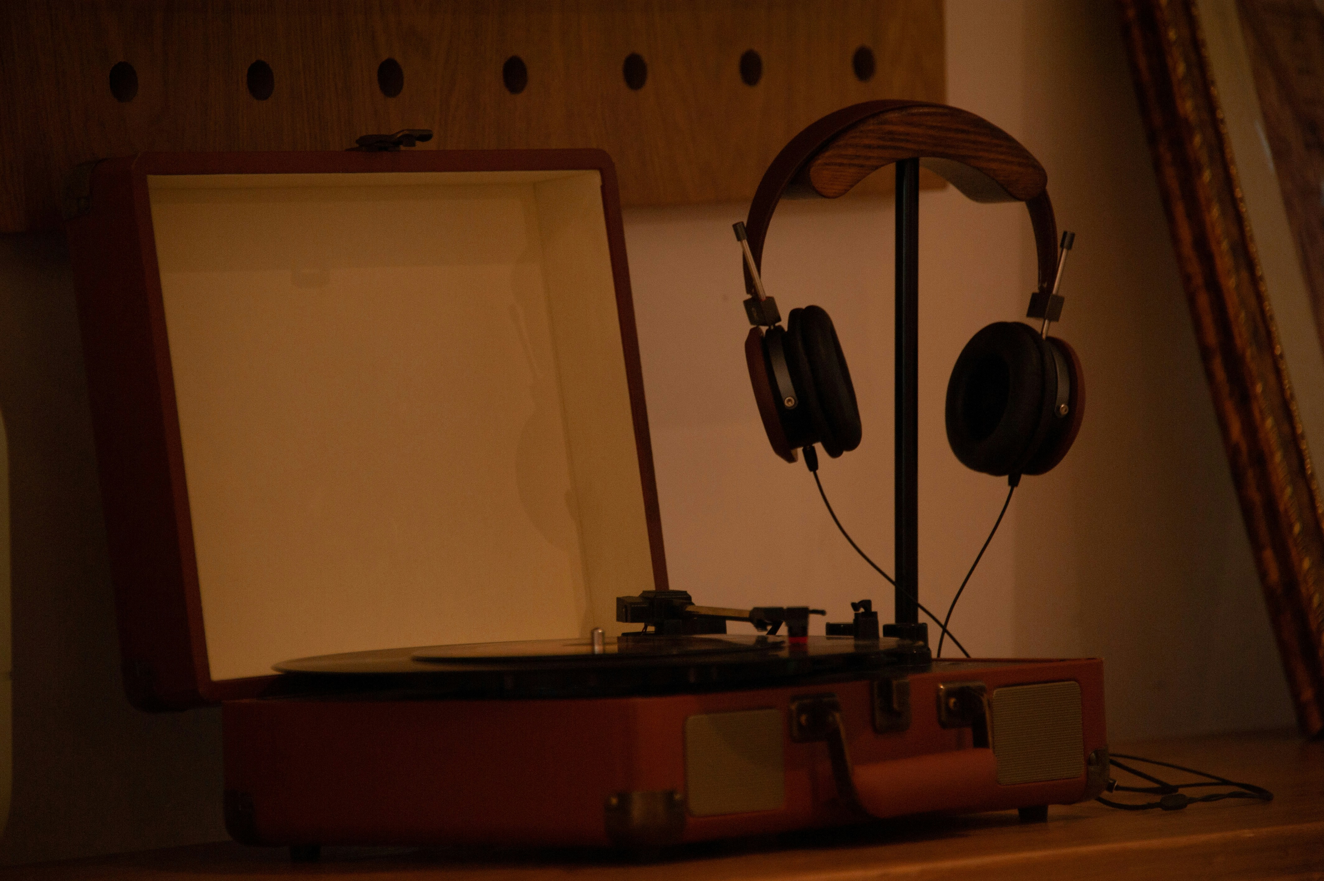 A turntable with headphones on top of it