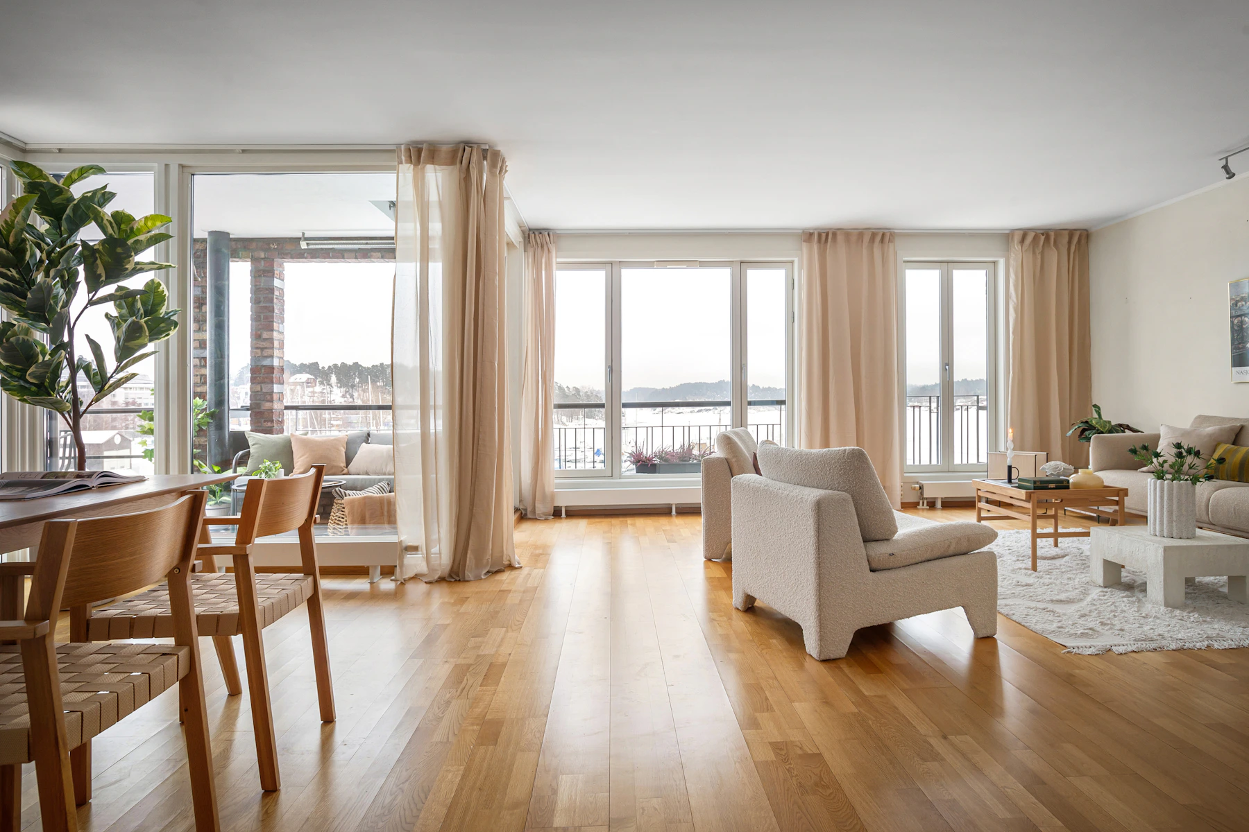 Bright living room with natural wood flooring