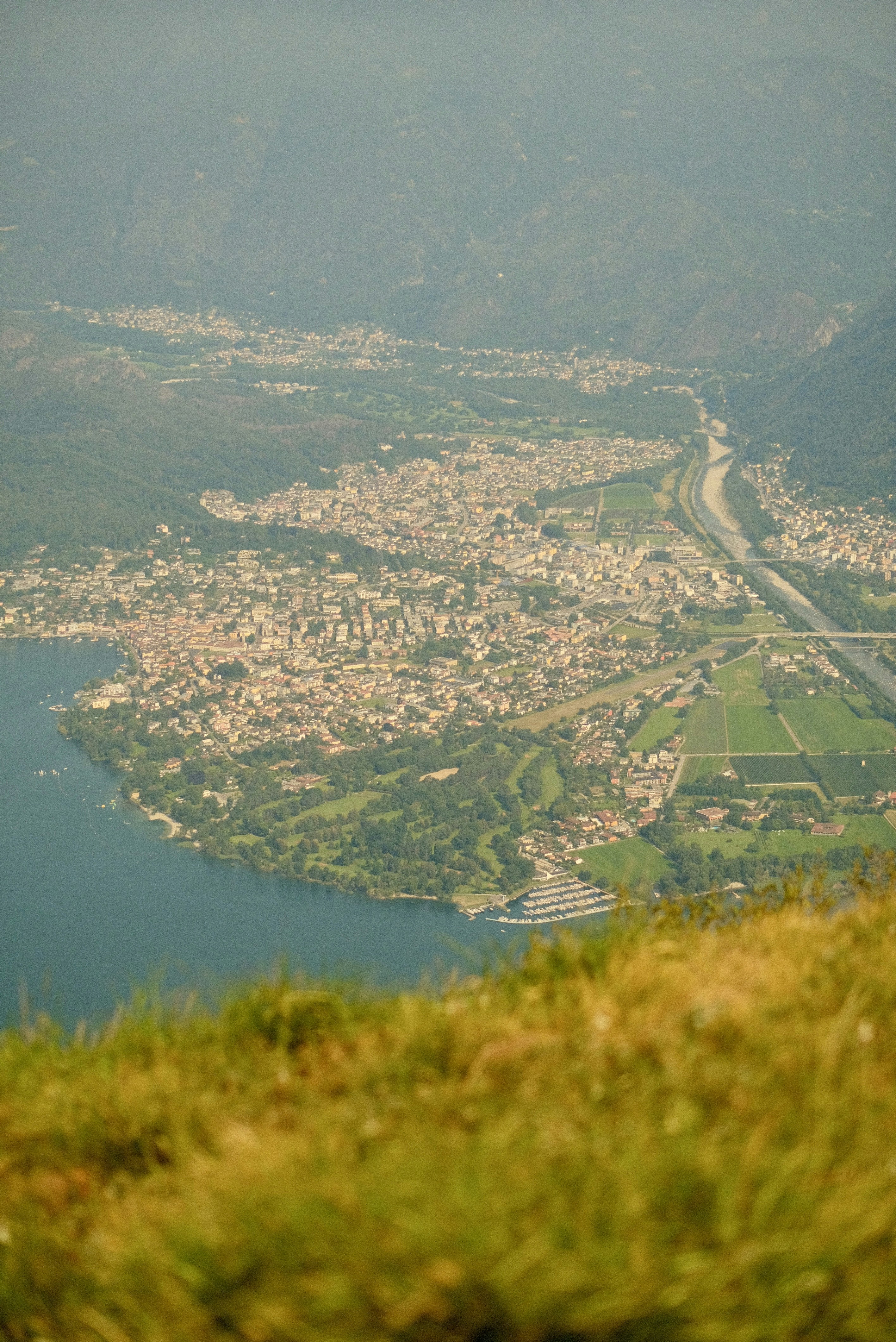 An aerial view of a city and a body of water