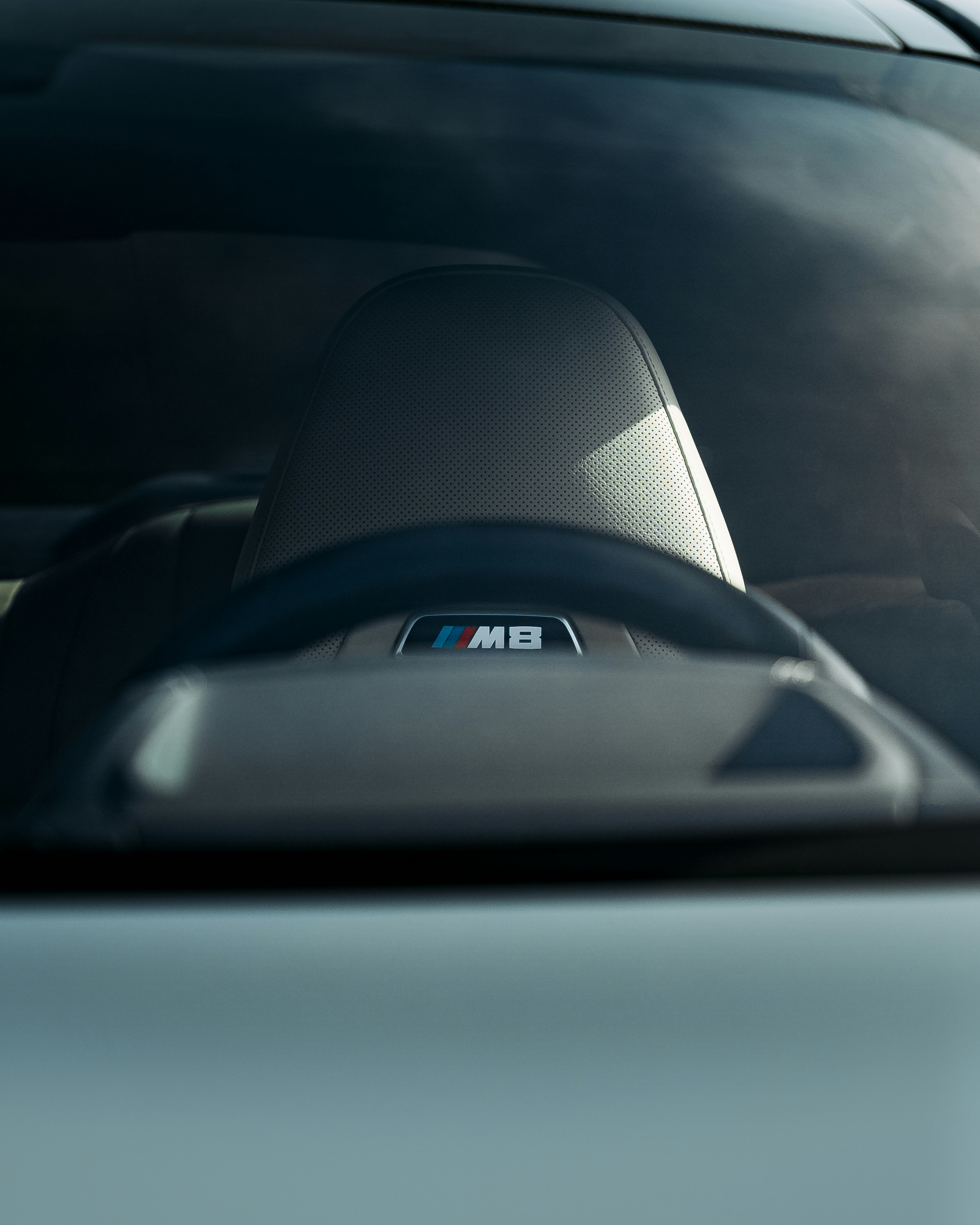 A close up of a car's rear view mirror