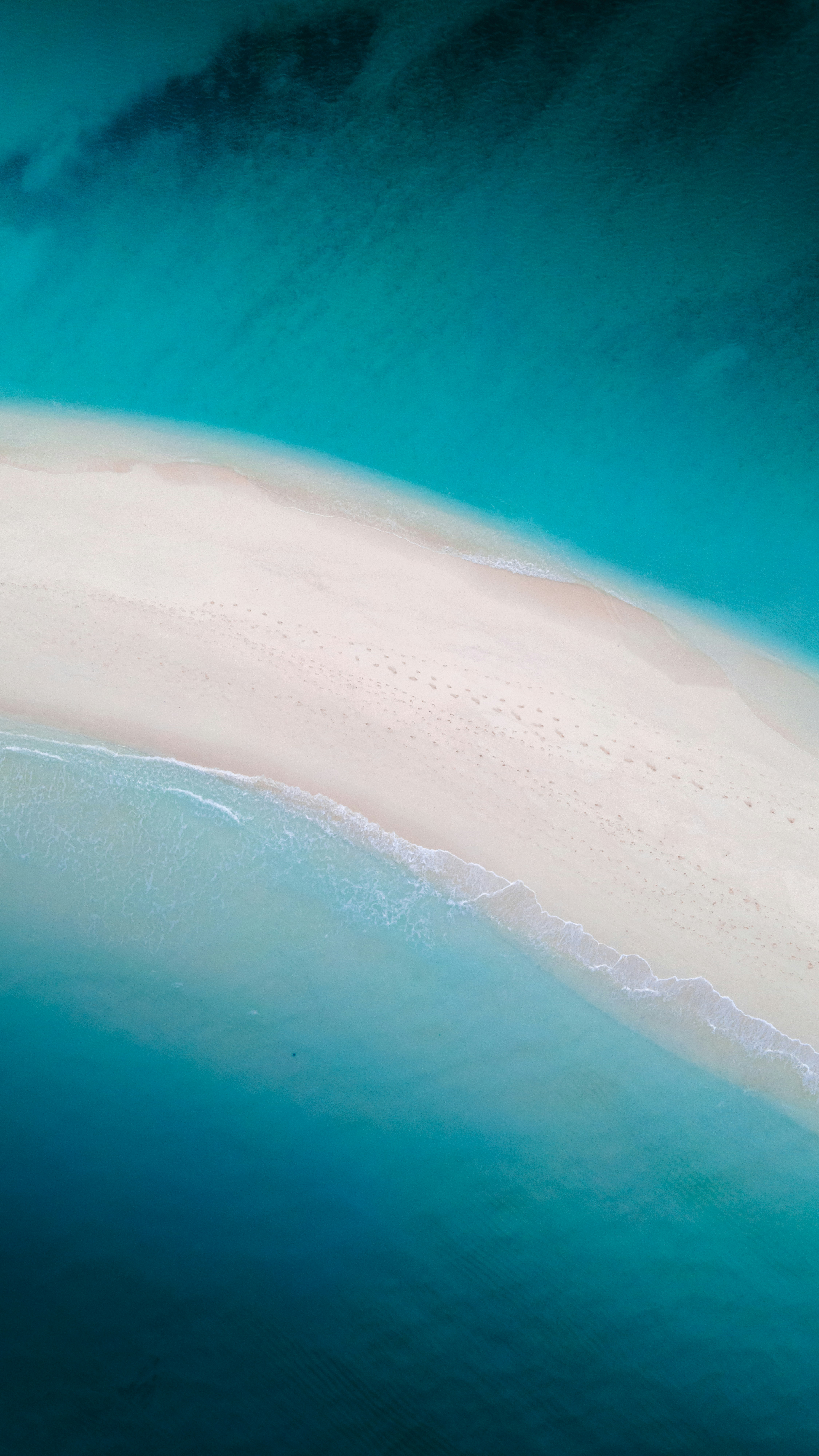 An aerial view of a beach and ocean