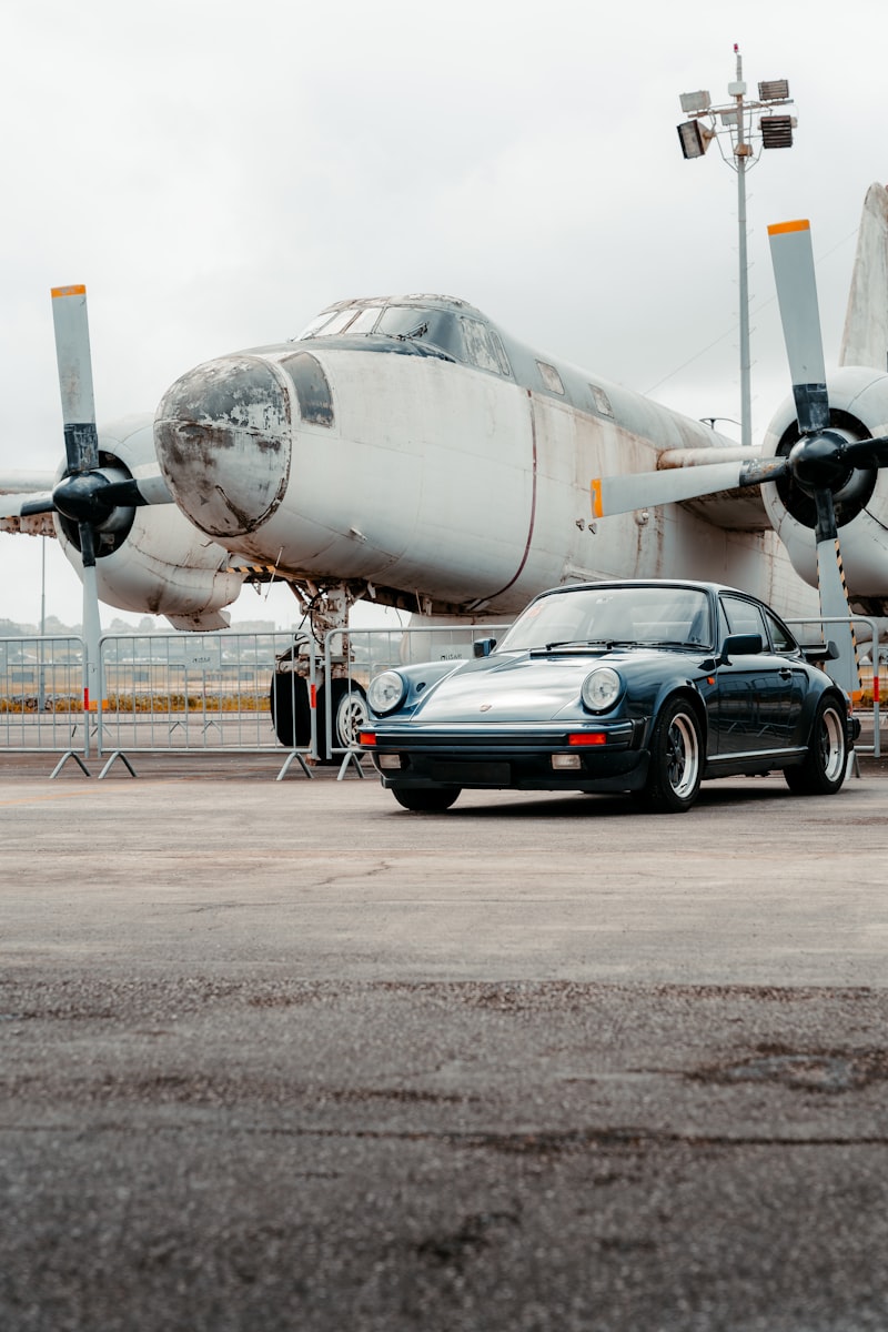 Car and plane at airport parking
